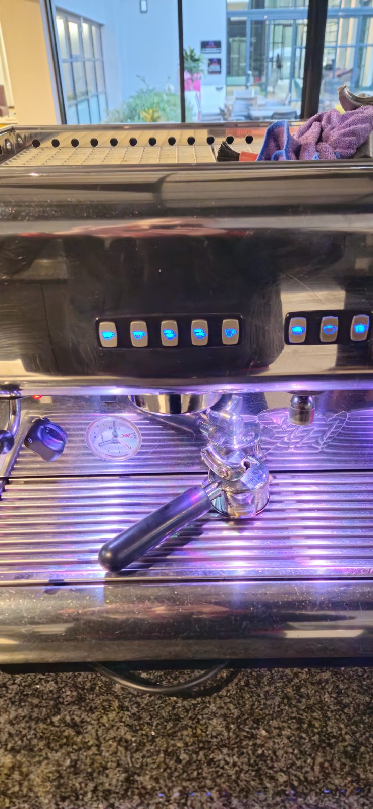 Close up of the espresso machine group heads