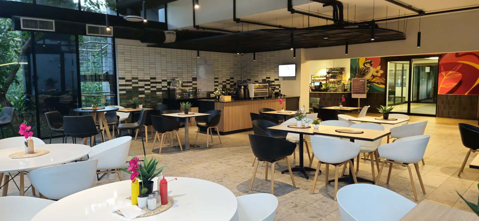 A Coffee Concepts coffee shop inside an office building, with the counter and seating