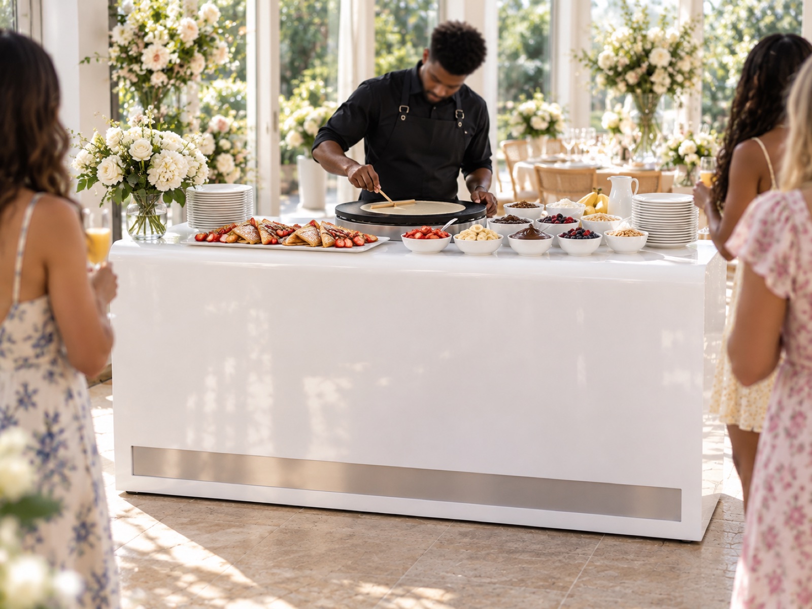 The crepe bar set up and staffed at an event