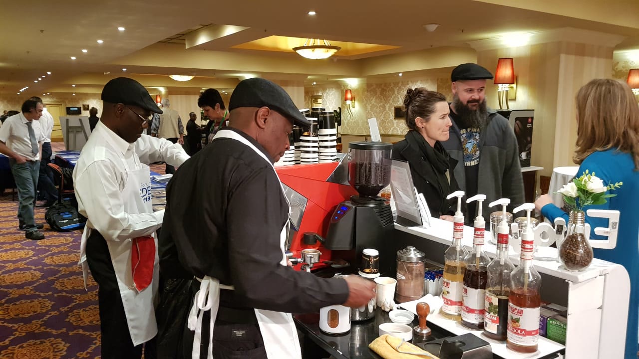 Coffee Concepts baristas serving guests at a corporate conference